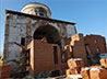 Стены алтаря Успенского собора на ВИЗе уже наполовину восстановлены