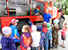 Экскурсию в пожарную часть организовали для детей прихожан Пантелеимоновского храма